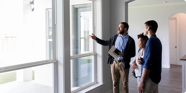 Broker presenting investment property for Rivara Capital commercial loan program